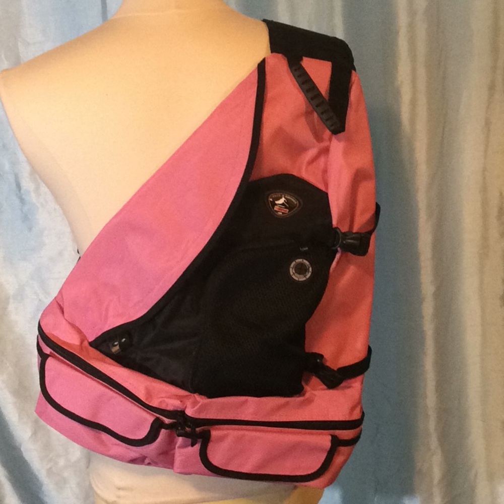 Backpack, 7 exterior pockets, padded back, 1 strap